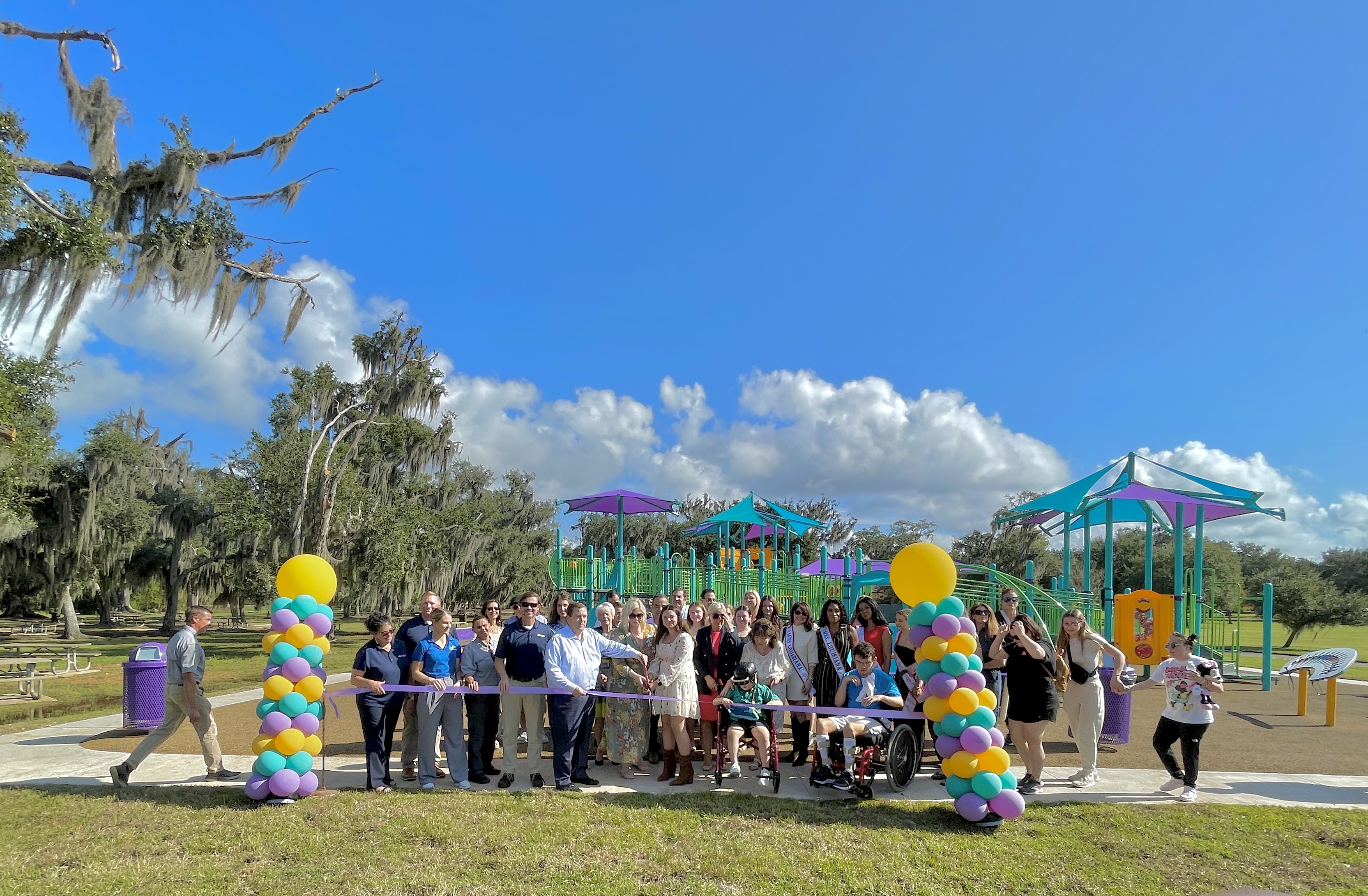 Lieutenant Governor Billy Nungesser and Louisiana State Parks officially opened an all-inclusive playground with a ribbon cutting on Wednesday, November 6, at Fontainebleau State Park in Mandeville, La. Cutting the ceremonial ribbon was Mila Aduli, the sister of Mina Aduli who was the inspiration behind the creation of the playground. The playground is one of two specialized playgrounds that were recently completed. The second playground is located at Bogue Chitto State Park in Franklinton.
