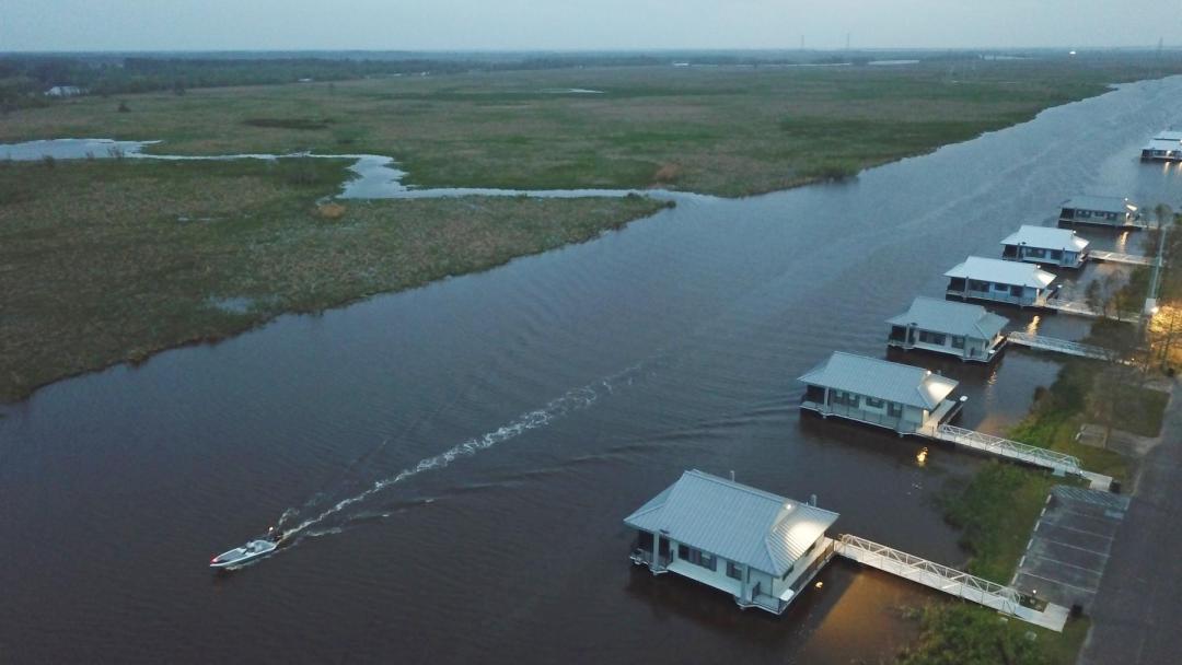 cabins at Bayou Segnette with boat