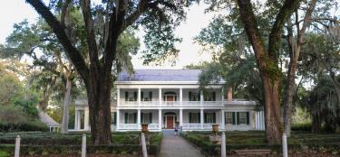 Tour the main residence and gardens at Rosedown State Historic Site