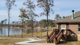 Cabin by lake at Jimmie Davis State Park