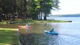 2 kayaks on a the bank of a lake at Lake Claiborne State Park
