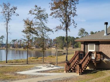Cabin by lake at Jimmie Davis State Park