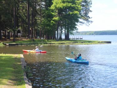 2 kayaks on a the bank of a lake at Lake Claiborne State Park